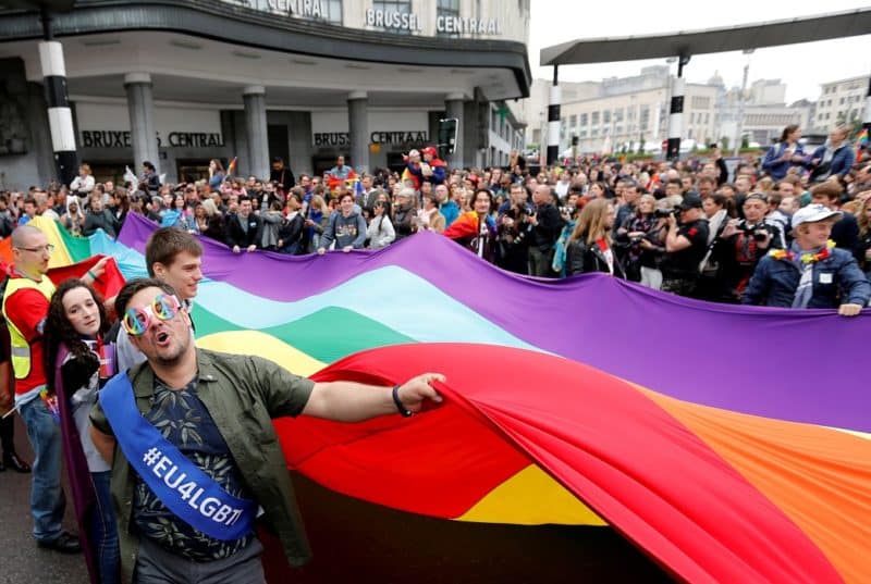 People take part in the annual Belgian LGBT Pride Parade in central Brussels in this May 19, 2018, file photo. The Flemish-speaking bishops of Belgium have authorized a prayer for committed gay couples on the condition it is clear that it is not equivalent to a wedding blessing. (CNS photo/Francois Lenoir, Reuters)