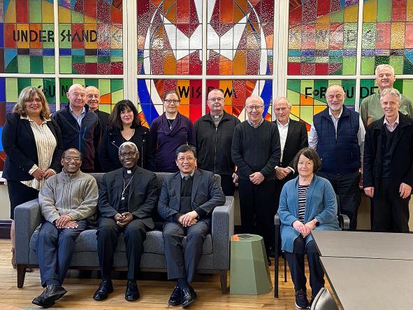 Archbishop Novatus Rugambwa sits next to CTC Catholic Theological College dean Dr John Evangelista (to the archbishop’s left) and Holy Cross Seminary rector Fr Matthew Vadakkevettuvazhiyil in this group photo with the college, seminary and Marist seminary staff.
