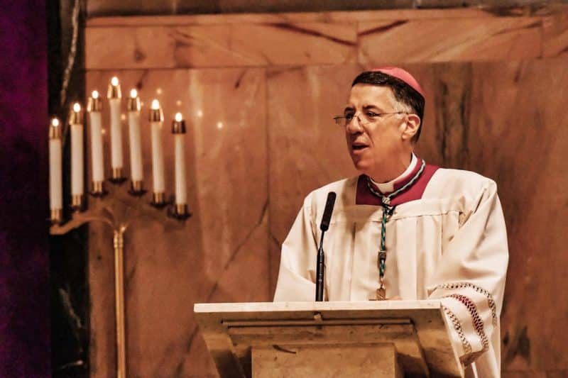 Bishop James F. Checchio of Metuchen, N.J., speaks at the Cathedral of St. Francis of Assisi in Metuchen, where via livestream he leads the faithful of the diocese in the rosary and a prayer of renewal Dec. 11, 2020, the vigil of the feast of Our Lady of Guadalupe. (CNS photo/Gerald Wutkowski Jr., courtesy Diocese of Metuchen)