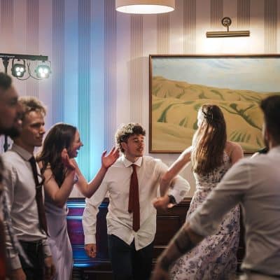 Young adults have a ball in two cities
