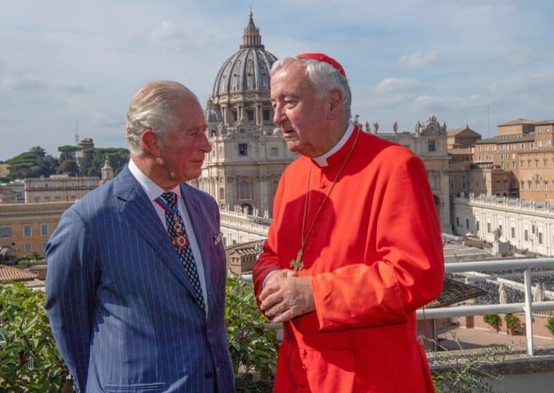 Then-Prince Charles of Britain and Cardinal Vincent Nichols of Westminster, England, chat during a reception at the Pontifical Urbanian University in Rome, Oct. 13, 2019, the day of the canonization of St. John Henry Newman and four others. (OSV News photo/Arthur Edwards, pool via Reuters)