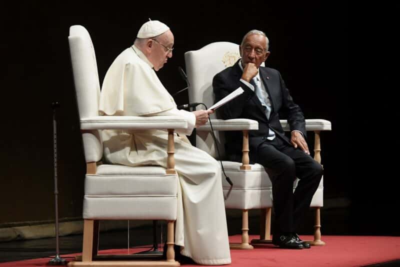 Pope Francis, seated next to Portuguese President Marcelo Rebelo de Sousa, gives his first speech in Portugal to government and political leaders, diplomats and representatives of civil society at the Belém Cultural Center in Lisbon, Aug. 2, 2023. (CNS photo/Vatican Media)