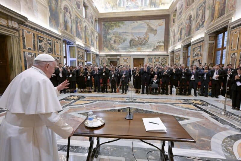 Pope Francis arrives for a meeting with the rectors of public and private universities from Latin America and the Caribbean at the Vatican Sept. 21, 2023. Responding to questions, the pope said his new document on the environment would be called "Laudate Deum" (Praise God). (CNS photo/Vatican Media)