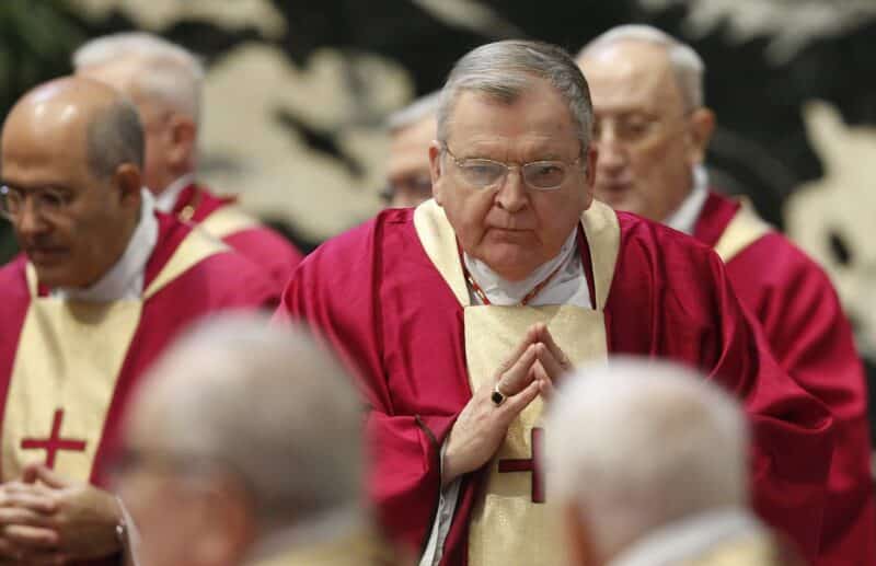 U.S. Cardinal Raymond L. Burke is pictured after receiving Communion during the funeral Mass for Australian Cardinal George Pell in St. Peter's Basilica at the Vatican in this file photo from Jan. 14, 2023. (CNS photo/Paul Haring)
