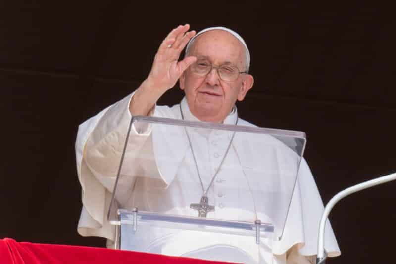 Pope Francis greets visitors gathered in St. Peter's Square at the Vatican to pray the Angelus Oct. 15, 2023. (CNS photo/Vatican Media)