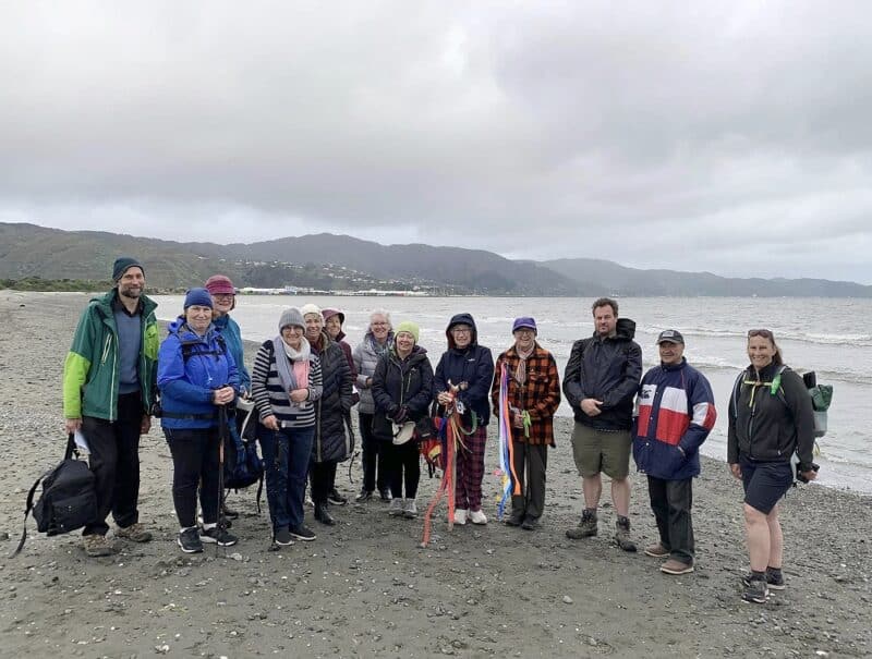 The final group of pilgrims on the beach at Pito-one (Petone)