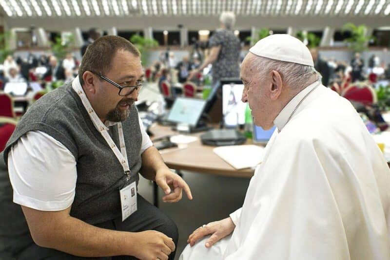 Auckland Vicar for Maori Manuel Beazley speaks with Pope Francis at the synod.