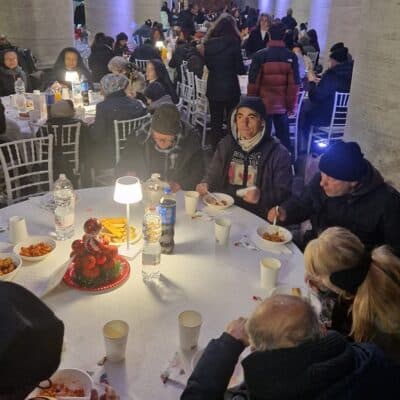 Special guests at dinner under Bernini’s colonnade in Rome – the homeless