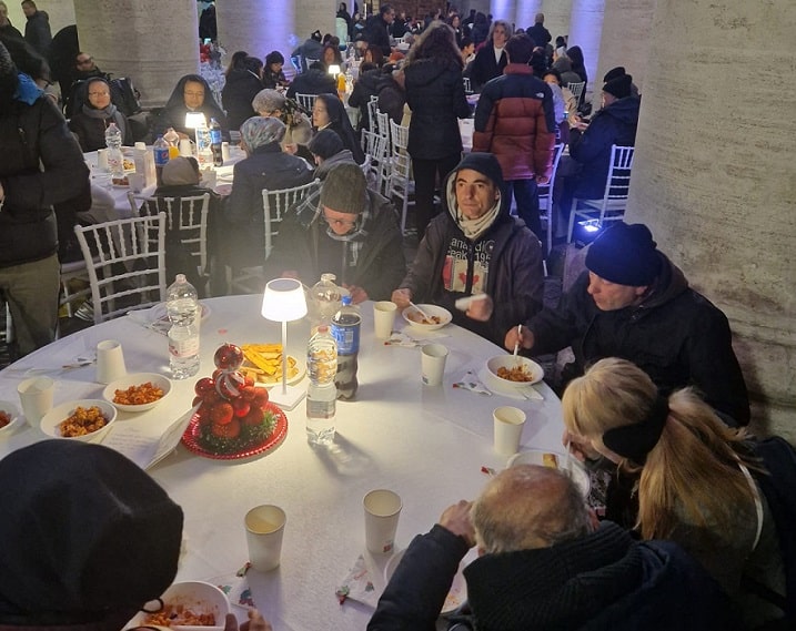 Dinner for 150 homeless people accompanied lightening of a Christmas tree in the Vatican Dec. 9, 2023, in an unusual space - under Bernini's colonnade. (OSV News photo/courtesy Dicastery for the Service of Charity)