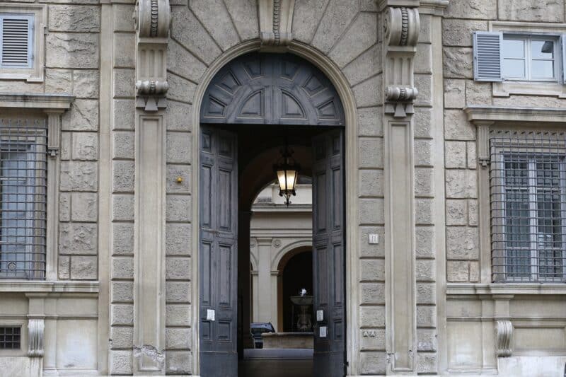 The main door at the headquarters of the Dicastery for the Doctrine of the Faith is seen at the Vatican in this Feb. 15, 2022, file photo. The dicastery issues a press release Jan. 4, 2023, addressing the reception of its declaration "Fiducia Supplicans" ("Supplicating Trust") among bishops' conferences. (CNS photo/Paul Haring)