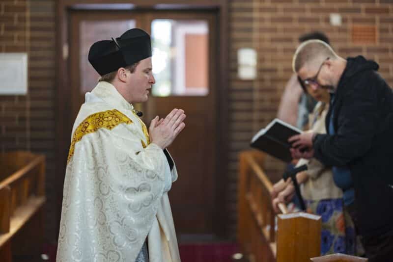 Parishioners pray and grieve at St. Patrick’s Church, in Sydney's Bondi neighbourhood, in the wake of the horrific knife attack at Bondi Junction on April 13, 2024. Father Ninian Doohan, visiting from Edinburgh, Scotland was present at Bondi Junction in the aftermath of the attack.(OSV News photo/Patrick Lee, The Catholic Weekly).